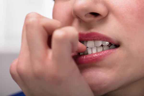 9 Ways to Stop Nail Biting: Neem Oil, Gloves, Self-adhesive Bandages